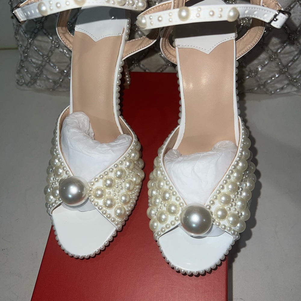 Brand new Pearle, shoes, beautiful pearls all over the shoe size 8